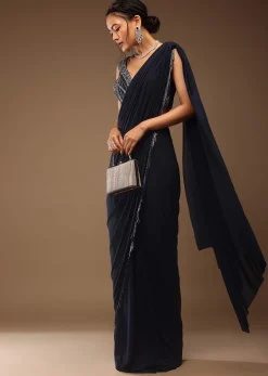 Mood Indigo Pre Drape Saree With A Crop Top In Sequins Embroidery Corset Neckline With A Tie-Up Tassel Dori At The Back