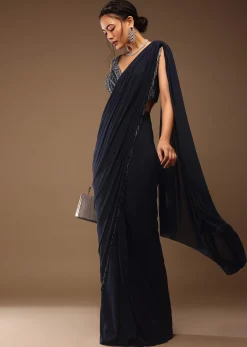 Mood Indigo Pre Drape Saree With A Crop Top In Sequins Embroidery Corset Neckline With A Tie-Up Tassel Dori At The Back