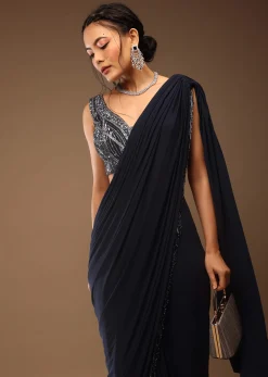 Mood Indigo Pre Drape Saree With A Crop Top In Sequins Embroidery Corset Neckline With A Tie-Up Tassel Dori At The Back
