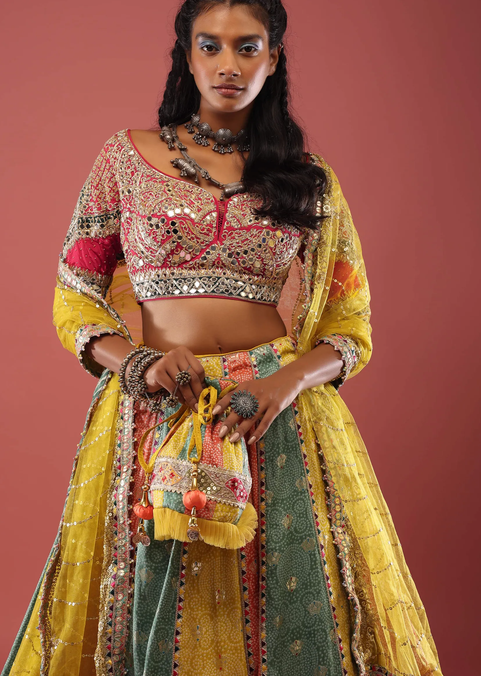 Multi Coloured Brocade Lehenga With Bandhani Print And Heavy Mirror Work On The Border