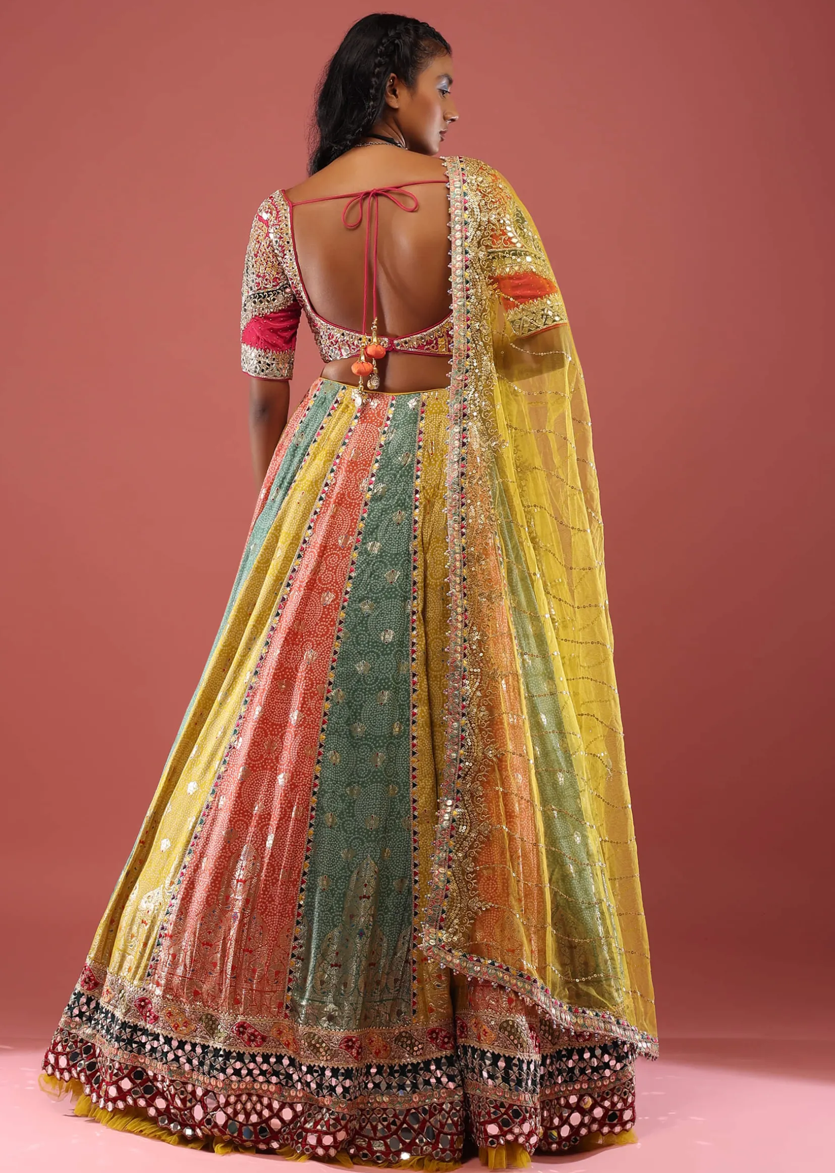 Multi Coloured Brocade Lehenga With Bandhani Print And Heavy Mirror Work On The Border