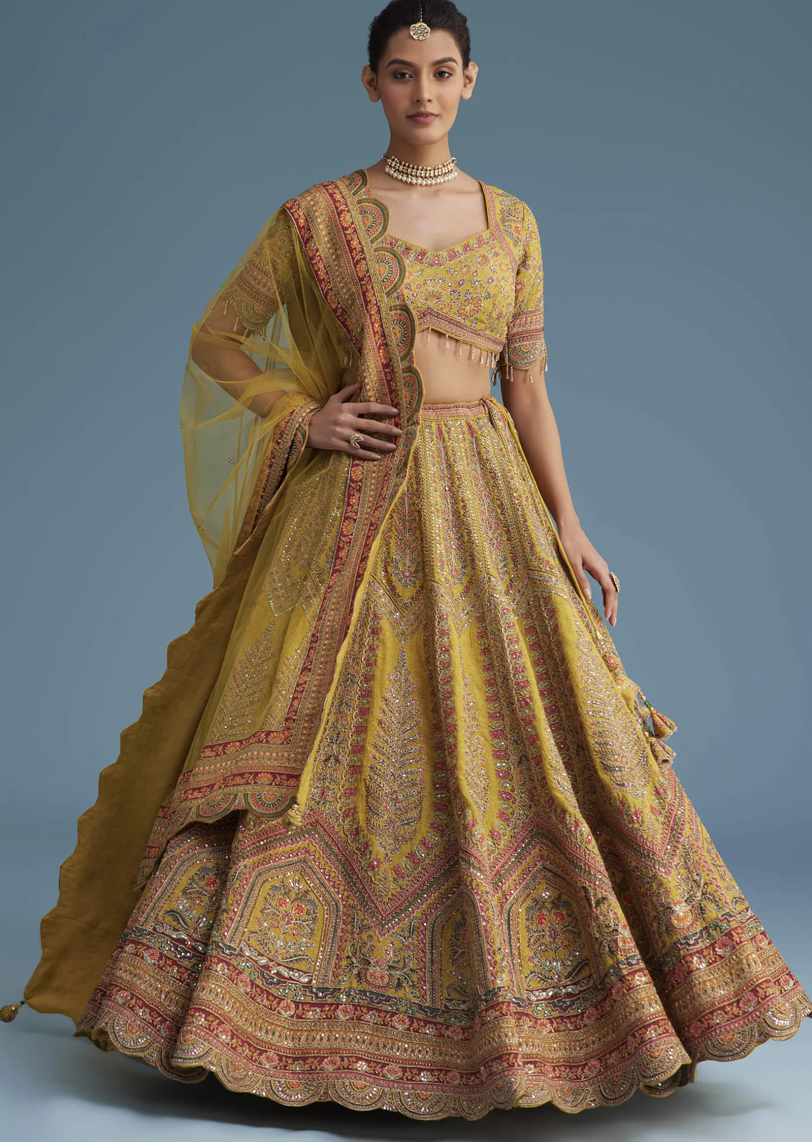 Mustard Crepe Lehenga Set With Floral Motif And Embroidery