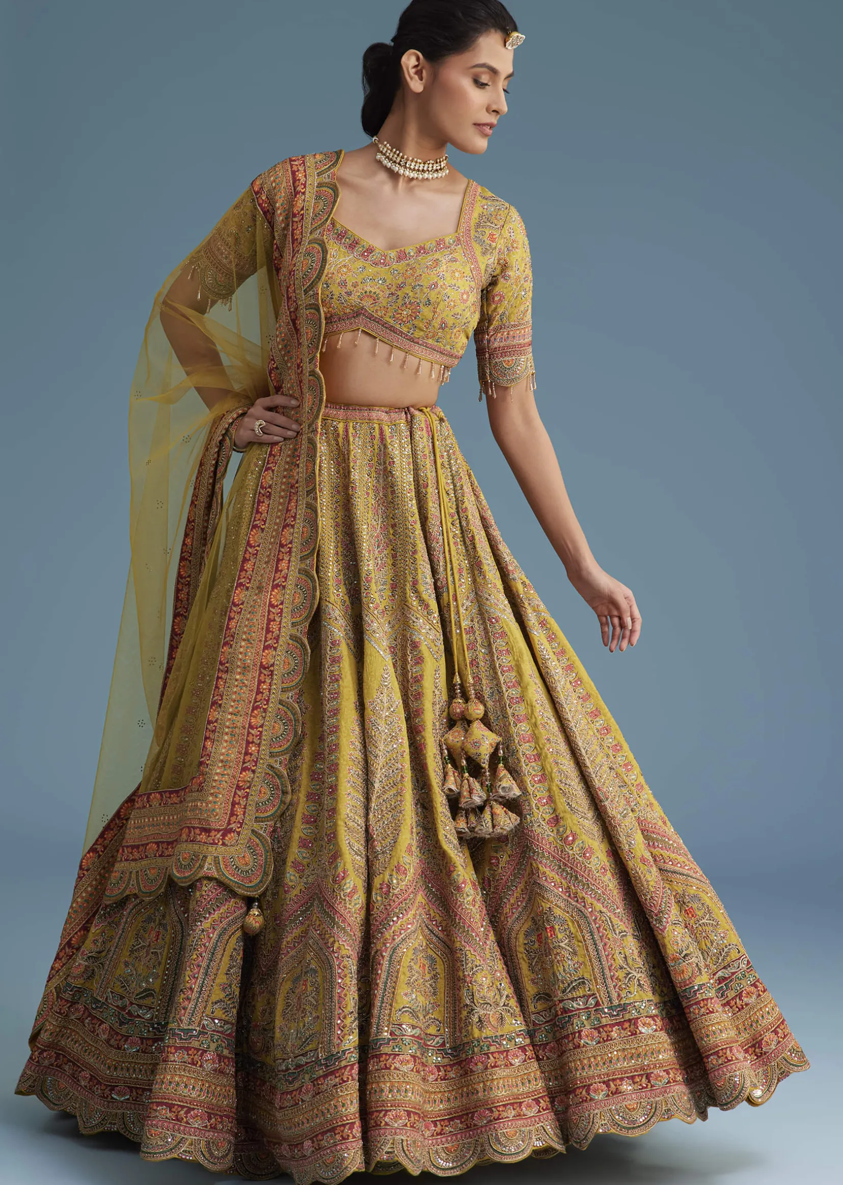 Mustard Crepe Lehenga Set With Floral Motif And Embroidery