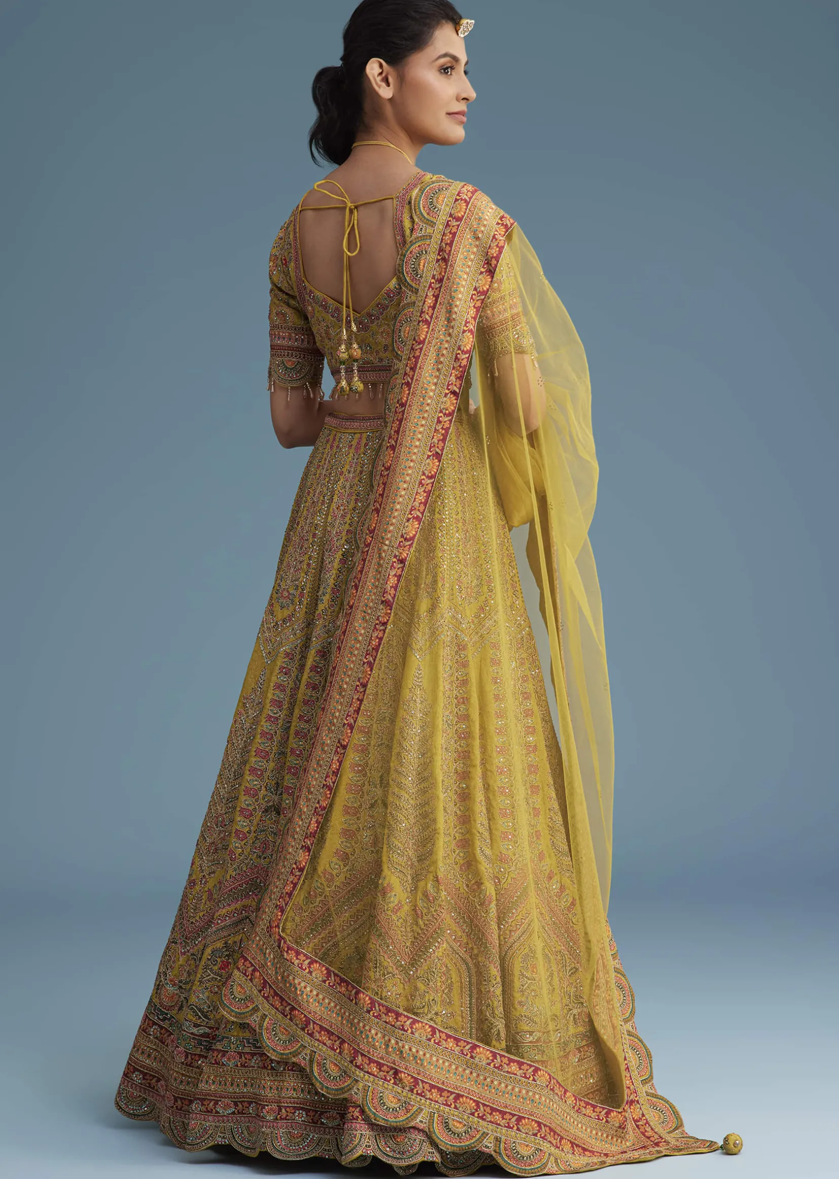 Mustard Crepe Lehenga Set With Floral Motif And Embroidery