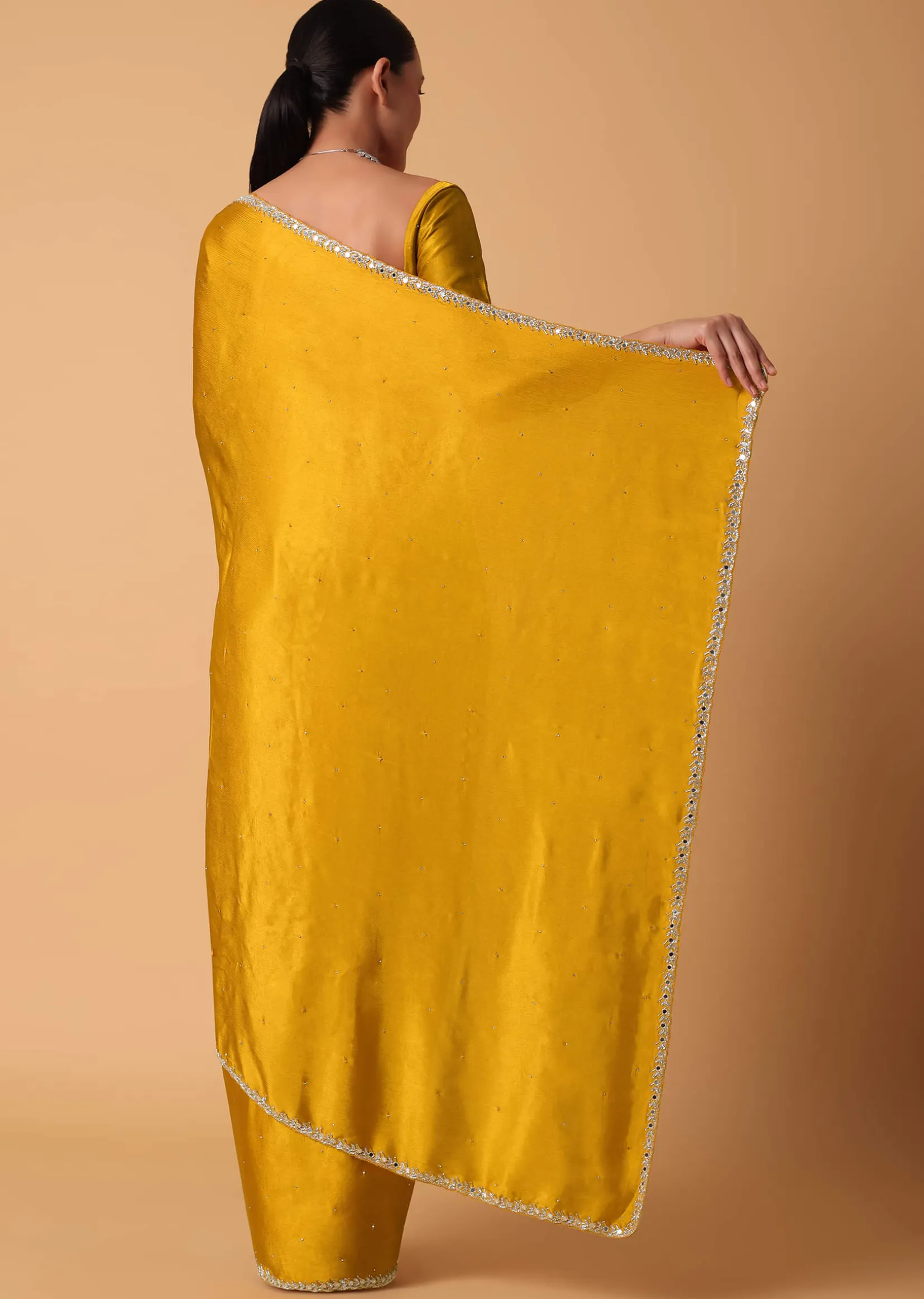 Mustard Satin Chinnon Saree With Mirror Detail Border And Unstitched Blouse Piece