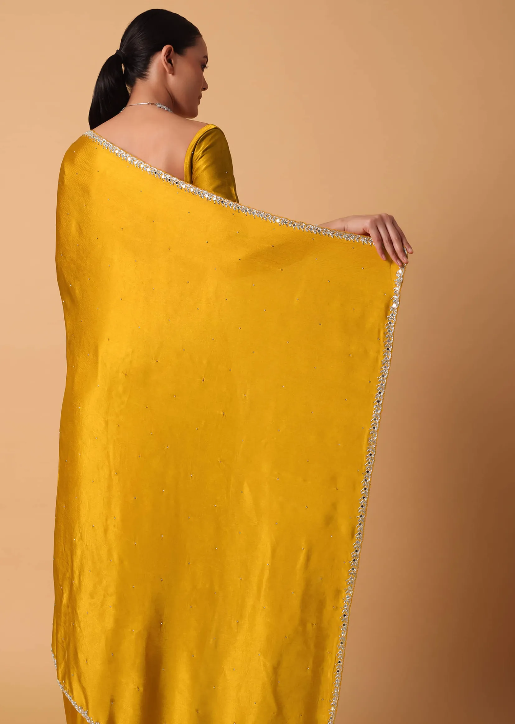 Mustard Satin Chinnon Saree With Mirror Detail Border And Unstitched Blouse Piece