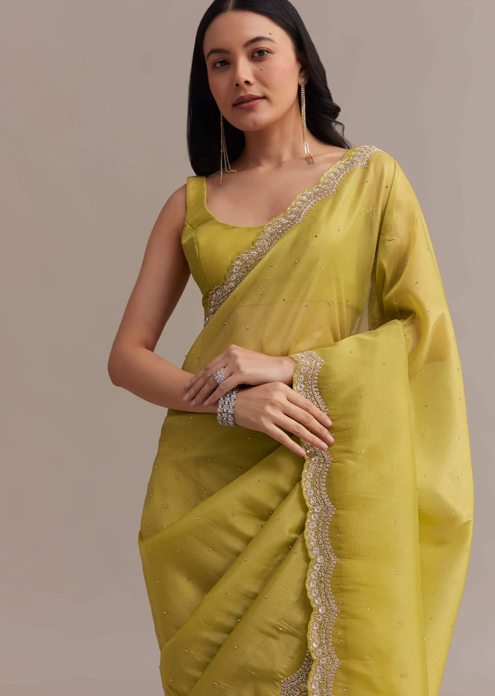Mustard Tissue Organza Saree With Sequins Embellished Border