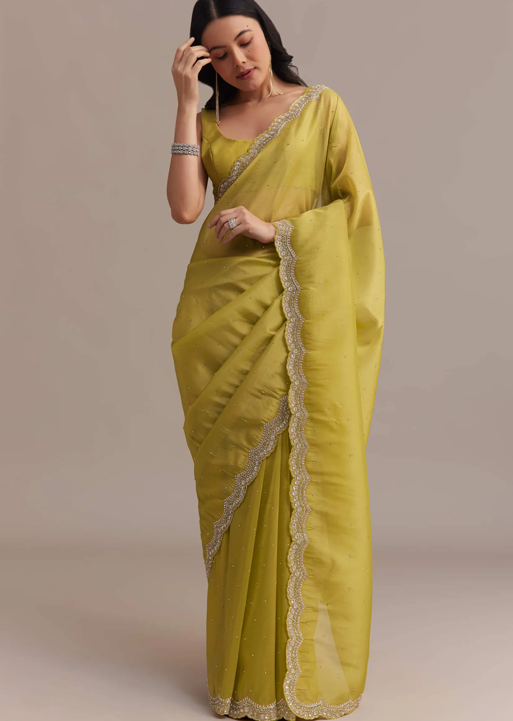 Mustard Tissue Organza Saree With Sequins Embellished Border