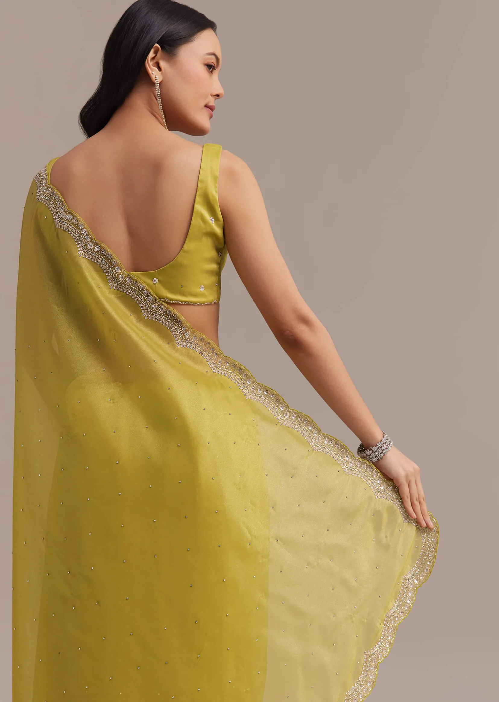 Mustard Tissue Organza Saree With Sequins Embellished Border