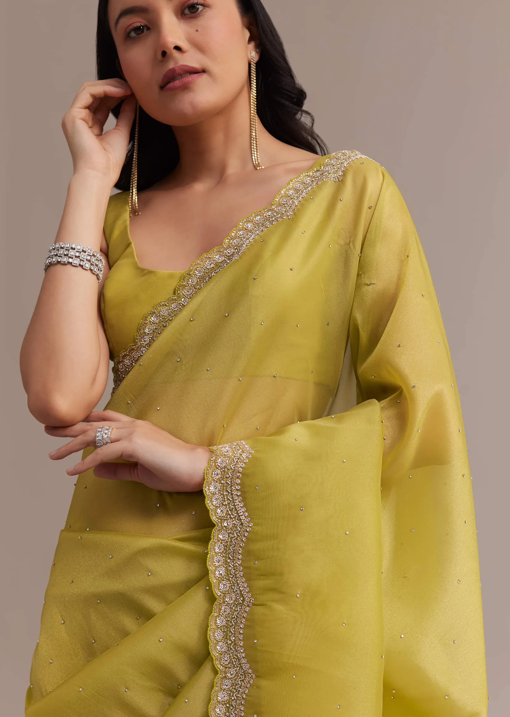 Mustard Tissue Organza Saree With Sequins Embellished Border