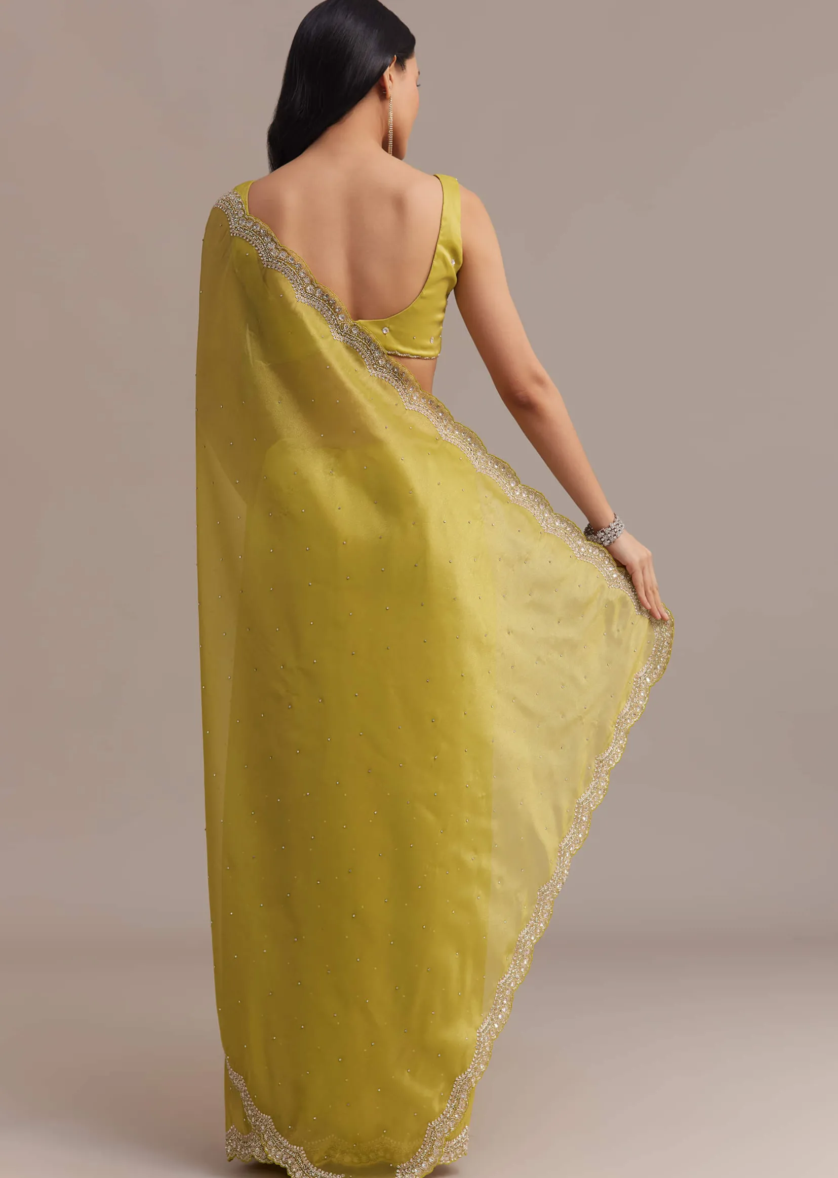 Mustard Tissue Organza Saree With Sequins Embellished Border