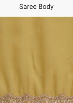 Mustard Tissue Organza Saree With Sequins Embellished Border