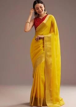 Mustard Yellow Crepe Silk Saree With Zari Border And Contrast Blouse