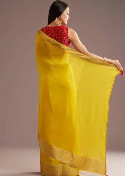 Mustard Yellow Crepe Silk Saree With Zari Border And Contrast Blouse
