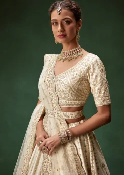Off White Bridal Lehenga Set With Boat Neck Blouse And Regal Zari Work