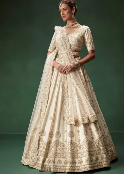 Off White Bridal Lehenga Set With Boat Neck Blouse And Regal Zari Work