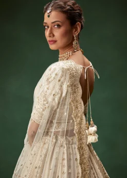 Off White Bridal Lehenga Set With Boat Neck Blouse And Regal Zari Work