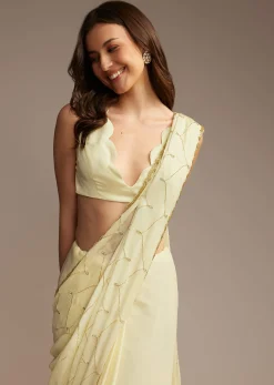 Off White Chinon Saree with Cutdana and Stone Work
