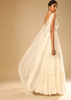 Off White Gown In Georgette With Tiered Flare And Hand Embroidered Leaf Motifs On The Bodice