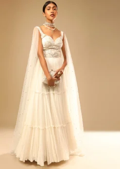 Off White Gown In Georgette With Tiered Flare And Hand Embroidered Leaf Motifs On The Bodice