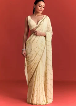 Off White Saree In Chinnon With Cutdana Embroidery