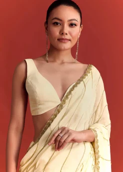 Off White Saree In Chinnon With Cutdana Embroidery