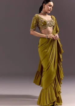 Olive Green Velvet Saree With Frilled Pallu And Heavy Embroidered Blouse