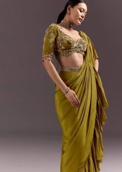 Olive Green Velvet Saree With Frilled Pallu And Heavy Embroidered Blouse