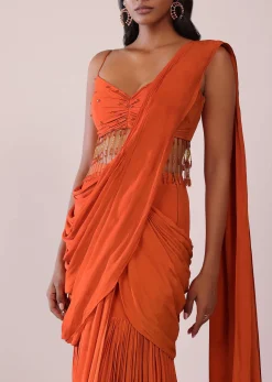 Orange Crepe Drape Saree And Blouse With Crystal Tassels All Over