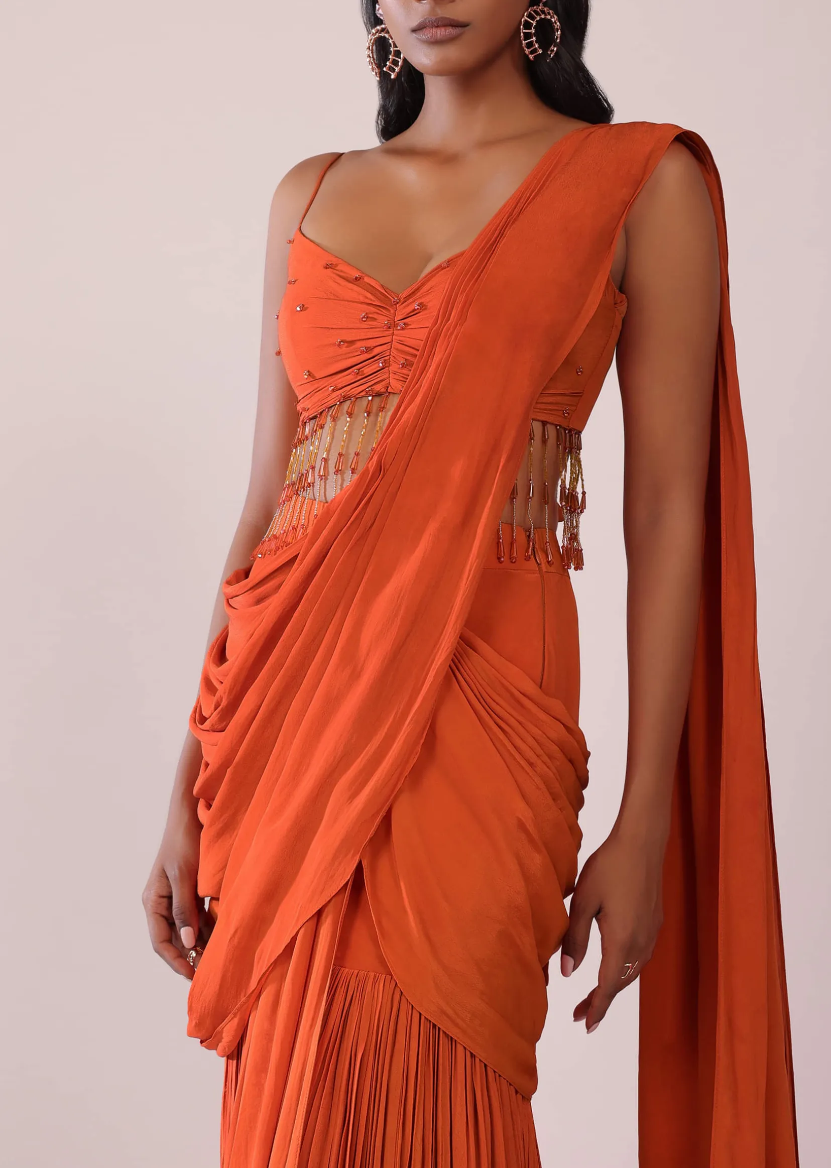 Orange Crepe Drape Saree And Blouse With Crystal Tassels All Over