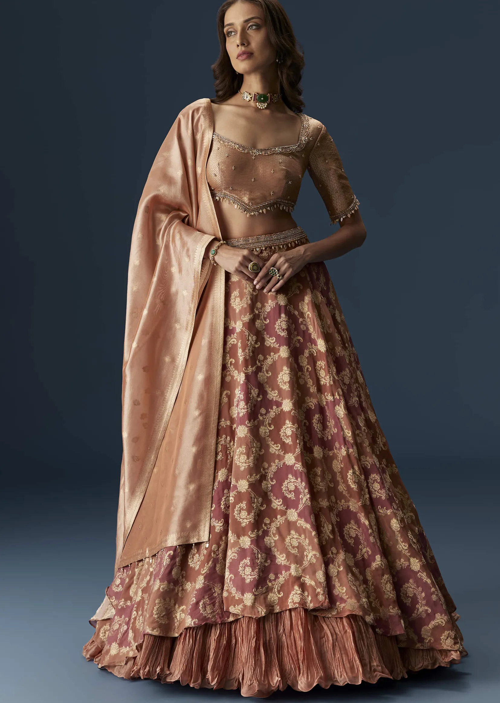 Orange Embroidered Blouse With Ruching Lehenga And Tassel Dupatta