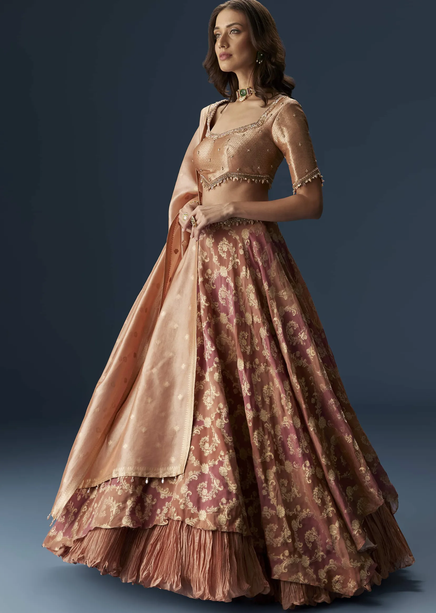 Orange Embroidered Blouse With Ruching Lehenga And Tassel Dupatta