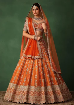 Orange Lehenga Set In Raw Silk With Hand Embroidered Motifs