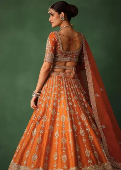 Orange Lehenga Set In Raw Silk With Hand Embroidered Motifs