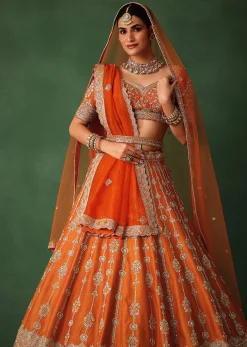 Orange Lehenga Set In Raw Silk With Hand Embroidered Motifs