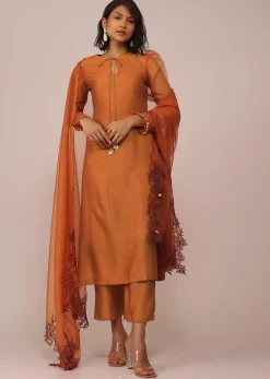 Orange Suit Set In Art Silk With Tassles On The Sleeves And Dupatta