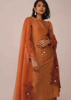 Orange Suit Set In Art Silk With Tassles On The Sleeves And Dupatta