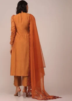 Orange Suit Set In Art Silk With Tassles On The Sleeves And Dupatta