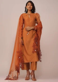 Orange Suit Set In Art Silk With Tassles On The Sleeves And Dupatta