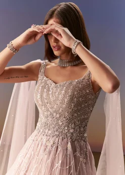 Pastel Pink Gown With Sheer Cape Drape And Heavy Embroidery
