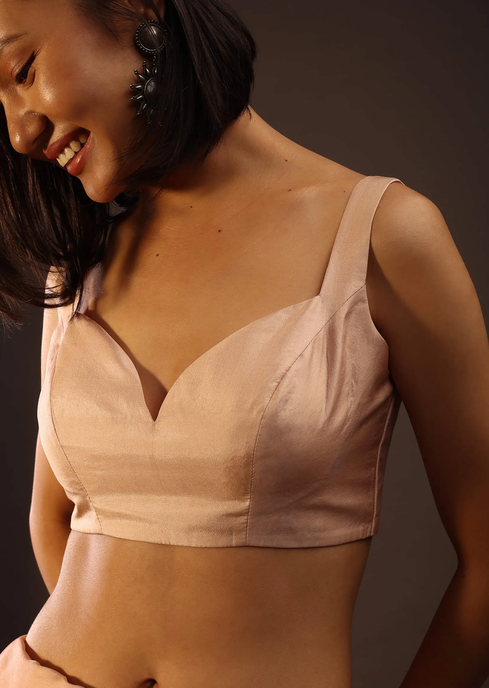 Peach Blush Sleeveless Blouse In A Sweetheart Neckline Back Hook Closure With A Straight Hemline