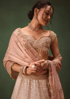 Peach Brocade Embroidered Bridal Lehenga With Two Dupattas