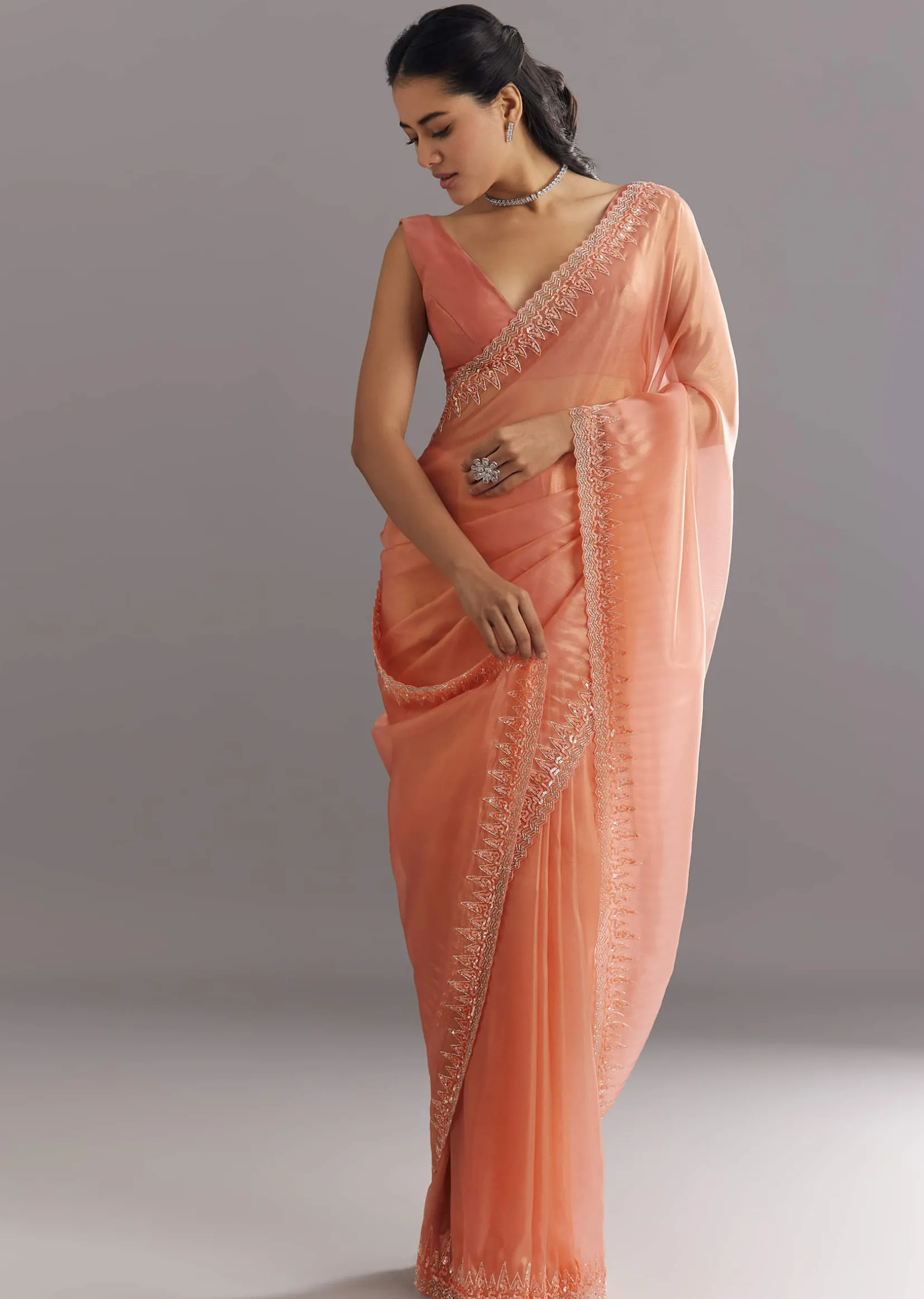 Peach Glass Tissue Saree With Cutdana Sequins Embroidery And Cutwork Scallop Border
