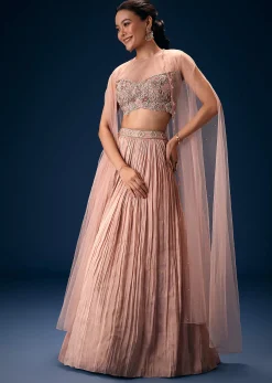 Peach Ruched Lehenga With Embroidered Blouse and Net Cape