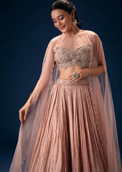 Peach Ruched Lehenga With Embroidered Blouse and Net Cape