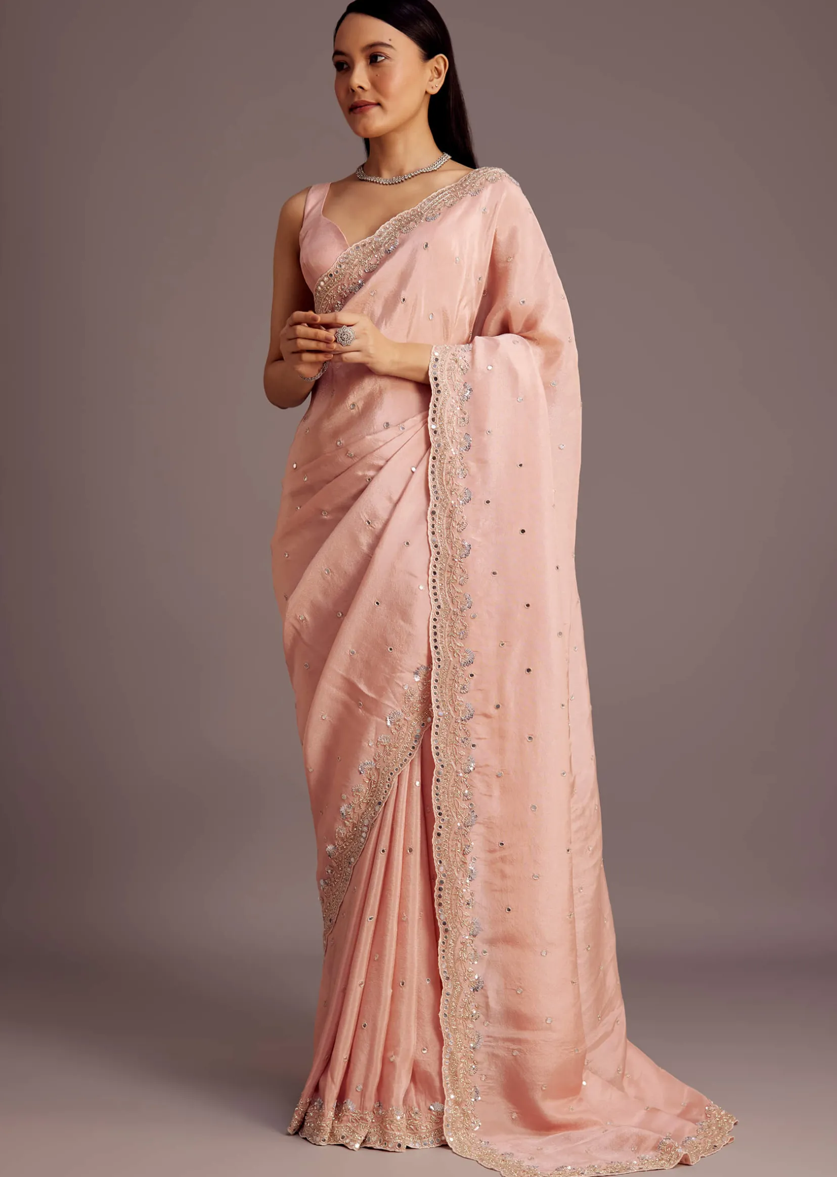 Peach Tissue Saree With Mirror Embroidered Border