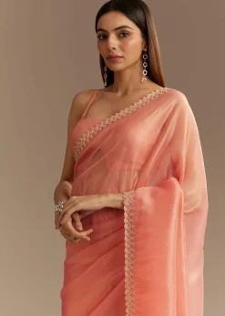 Peach Tissue Saree With Stones Cutdana Embellishments And Scallop Border