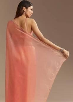 Peach Tissue Saree With Stones Cutdana Embellishments And Scallop Border