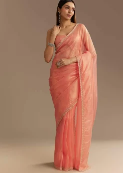 Peach Tissue Saree With Stones Cutdana Embellishments And Scallop Border