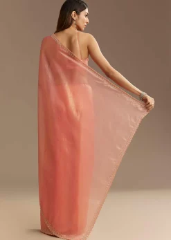 Peach Tissue Saree With Stones Cutdana Embellishments And Scallop Border